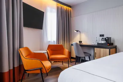 Ein Bett oder Betten in einem Zimmer der Unterkunft Radisson RED Berlin Kudamm