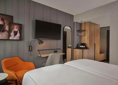 Ein Bett oder Betten in einem Zimmer der Unterkunft Radisson RED Berlin Kudamm