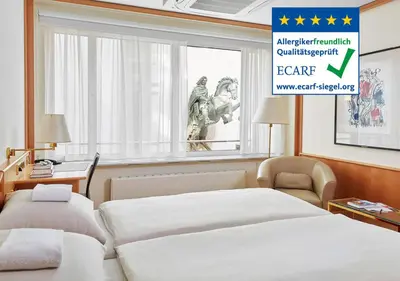 Ein Bett oder Betten in einem Zimmer der Unterkunft Living Hotel Großer Kurfürst