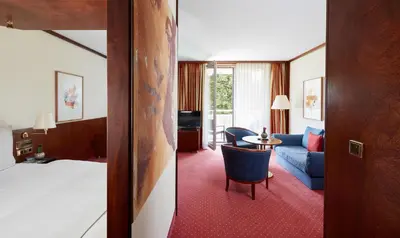 Ein Bett oder Betten in einem Zimmer der Unterkunft Living Hotel Weißensee