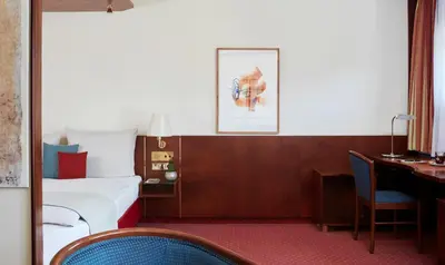 Ein Sitzbereich in der Unterkunft Living Hotel Weißensee