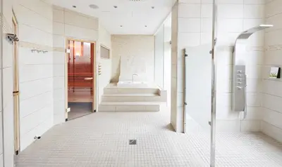 Ein Badezimmer in der Unterkunft Living Hotel Weißensee