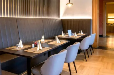 Ein Restaurant oder anderes Speiselokal in der Unterkunft Living Hotel Weißensee