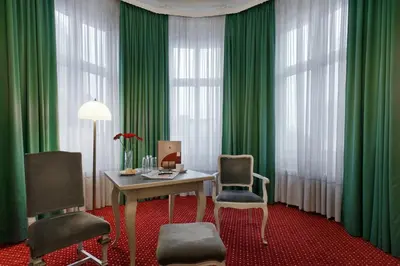 Ein Sitzbereich in der Unterkunft Acom Hotel Berlin Kurfürstendamm