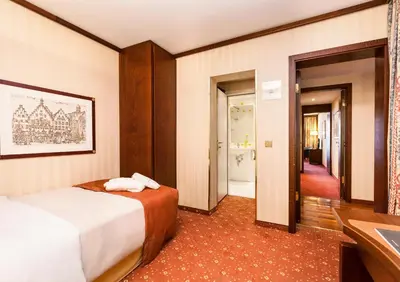 Ein Bett oder Betten in einem Zimmer der Unterkunft Living Hotel Berlin Mitte