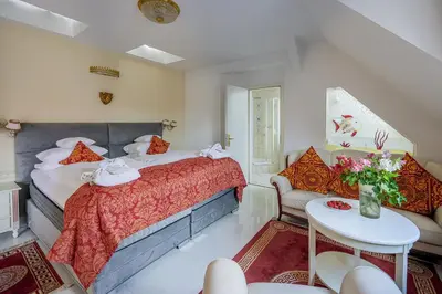 Ein Bett oder Betten in einem Zimmer der Unterkunft Hotel Augusta Am Kurfürstendamm