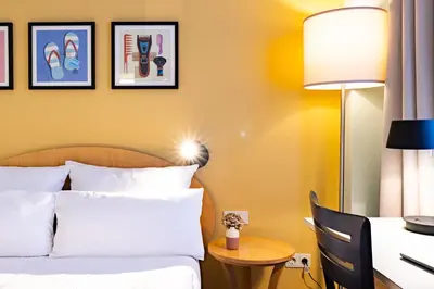 Ein Bett oder Betten in einem Zimmer der Unterkunft Garner Hotel Berlin - Messe by IHG