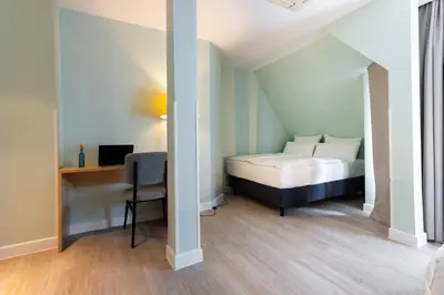 Ein Bett oder Betten in einem Zimmer der Unterkunft Garner Hotel Berlin - Messe by IHG