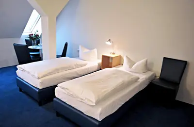 Ein Bett oder Betten in einem Zimmer der Unterkunft Hotel Transit Loft