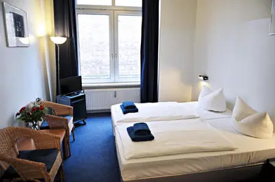 Ein Bett oder Betten in einem Zimmer der Unterkunft Hotel Transit Loft