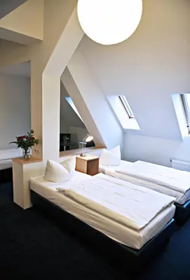Ein Bett oder Betten in einem Zimmer der Unterkunft Hotel Transit Loft