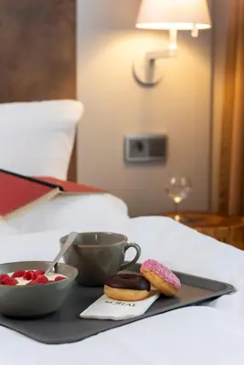 Ein Bett oder Betten in einem Zimmer der Unterkunft SORAT Hotel Berlin