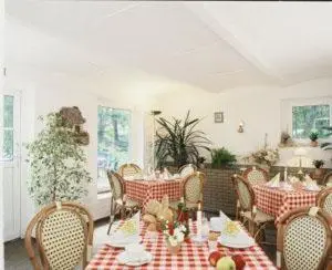 Ein Restaurant oder anderes Speiselokal in der Unterkunft Hotel Sperlingshof