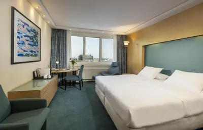 Ein Bett oder Betten in einem Zimmer der Unterkunft Maritim proArte Hotel Berlin