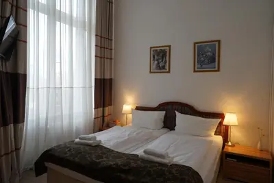 Ein Bett oder Betten in einem Zimmer der Unterkunft City Pension Berlin
