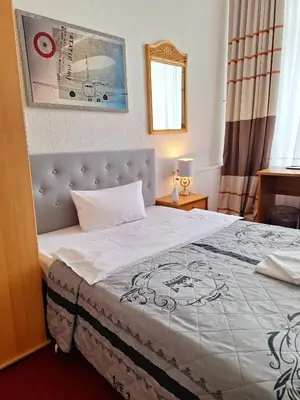 Ein Bett oder Betten in einem Zimmer der Unterkunft City Pension Berlin