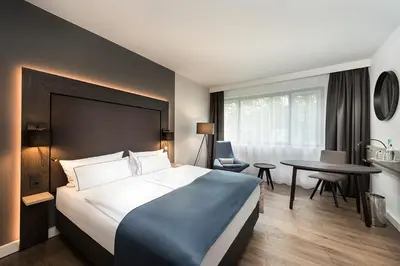 Ein Bett oder Betten in einem Zimmer der Unterkunft Holiday Inn Berlin City-West by IHG