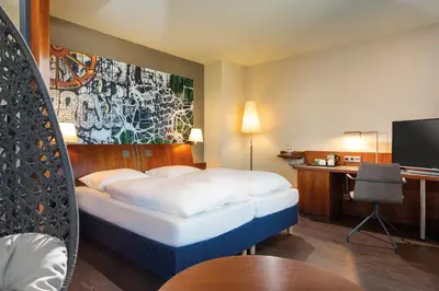 Ein Bett oder Betten in einem Zimmer der Unterkunft Seminaris SeeHotel Potsdam