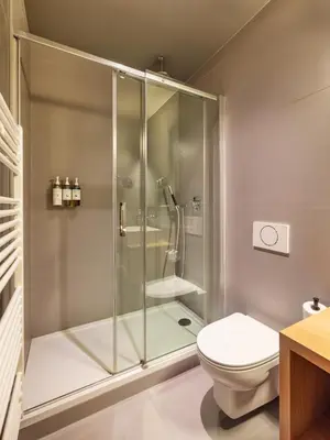 Ein Badezimmer in der Unterkunft Numa Berlin Kudamm