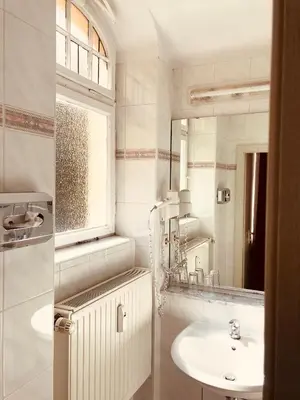 Ein Badezimmer in der Unterkunft Hotel Castell am Kurfürstendamm