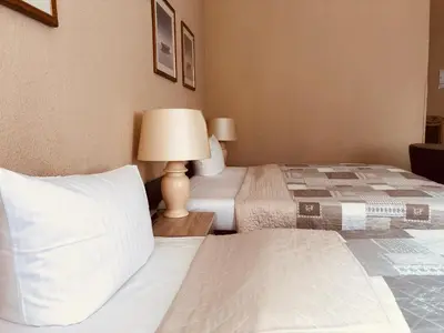 Ein Bett oder Betten in einem Zimmer der Unterkunft Hotel Castell am Kurfürstendamm