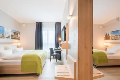 Ein Bett oder Betten in einem Zimmer der Unterkunft Best Western Hotel Kantstrasse Berlin