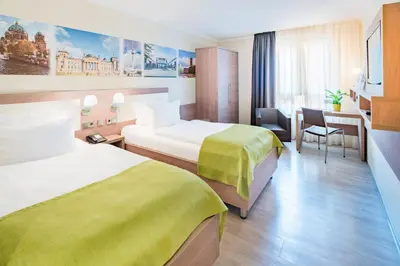 Ein Bett oder Betten in einem Zimmer der Unterkunft Best Western Hotel Kantstrasse Berlin