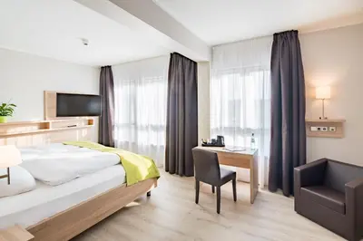 Ein Bett oder Betten in einem Zimmer der Unterkunft Best Western Hotel Kantstrasse Berlin