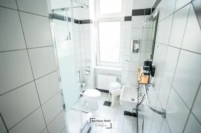 Ein Badezimmer in der Unterkunft Boutique Hotel Kerlin