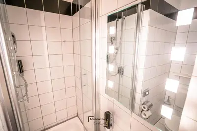 Ein Badezimmer in der Unterkunft Boutique Hotel Kerlin