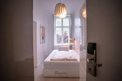 Ein Bett oder Betten in einem Zimmer der Unterkunft Boutique Hotel Kerlin