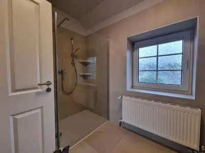 Ein Badezimmer in der Unterkunft Ferienwohnungen Springer in Schönefeld OT Großziethen div Apartments für bis zu 6 Personen