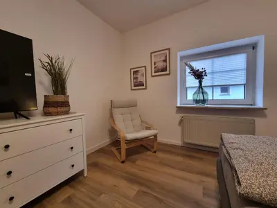 Ein Sitzbereich in der Unterkunft Ferienwohnungen Springer in Schönefeld OT Großziethen div Apartments für bis zu 6 Personen
