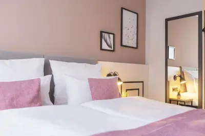 Ein Bett oder Betten in einem Zimmer der Unterkunft Garner Hotel Berlin - Ku'Damm by IHG