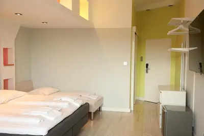 Ein Bett oder Betten in einem Zimmer der Unterkunft Art Hotel Charlottenburger Hof Berlin