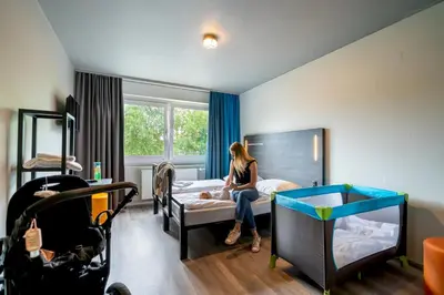 Ein Bett oder Betten in einem Zimmer der Unterkunft a&o Berlin Kolumbus