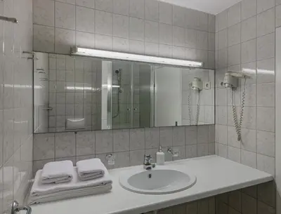 Ein Badezimmer in der Unterkunft Hotel Nova