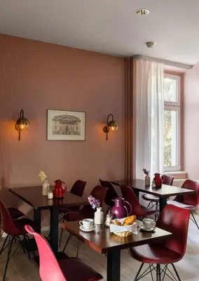 Ein Sitzbereich in der Unterkunft Hotel Nova