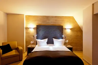 Ein Bett oder Betten in einem Zimmer der Unterkunft Artim Hotel