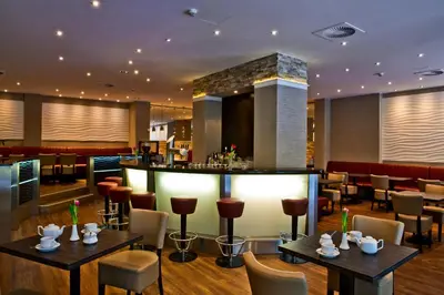 Ein Sitzbereich in der Unterkunft Artim Hotel