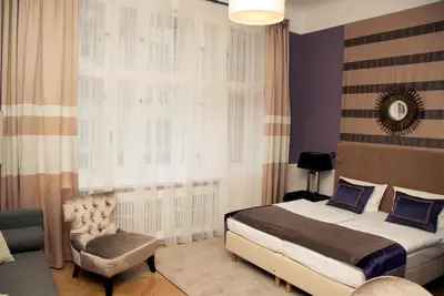 Ein Bett oder Betten in einem Zimmer der Unterkunft Hotel Elba am Kurfürstendamm - Design Chambers