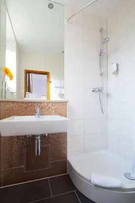 Ein Badezimmer in der Unterkunft Hotel Elba am Kurfürstendamm - Design Chambers