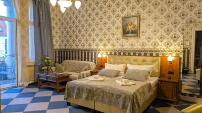 Ein Bett oder Betten in einem Zimmer der Unterkunft Hotel Pension Bella