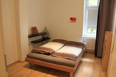 Ein Bett oder Betten in einem Zimmer der Unterkunft Pappel