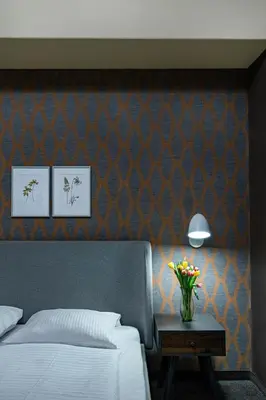 Ein Bett oder Betten in einem Zimmer der Unterkunft Hotel BELLEVUE am Kurfürstendamm