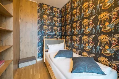 Ein Bett oder Betten in einem Zimmer der Unterkunft Design Apartments - 
