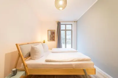 Ein Bett oder Betten in einem Zimmer der Unterkunft Design Apartments - 