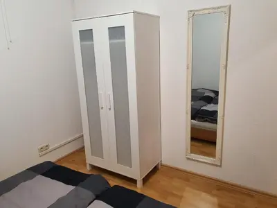 Ein Bett oder Betten in einem Zimmer der Unterkunft DRAGO Helles 3 Raum Appartement auf der Dominsel im Herzen der Stadt