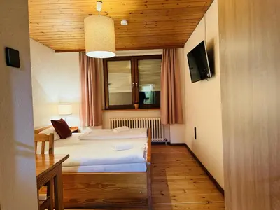Ein Bett oder Betten in einem Zimmer der Unterkunft Hotel Nest