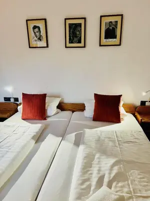 Ein Bett oder Betten in einem Zimmer der Unterkunft Hotel Nest